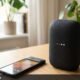 Smartphone resting on wooden desk beside Amazon Echo speaker while updating Wi-Fi network settings