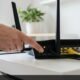 How to restart your router by pressing the power button on the back panel